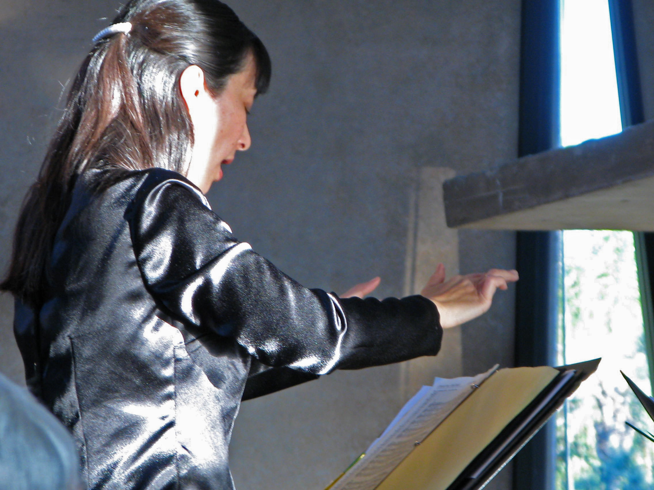 woman conducting a choir